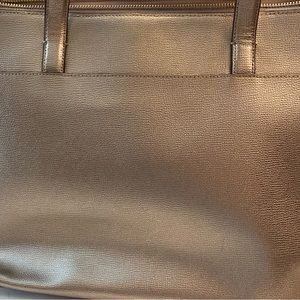 Kate Spade tote. Gold Metallic. Gently used. Dust bag not included.